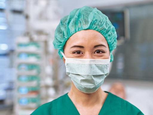 Female nurse is wearing a face mask