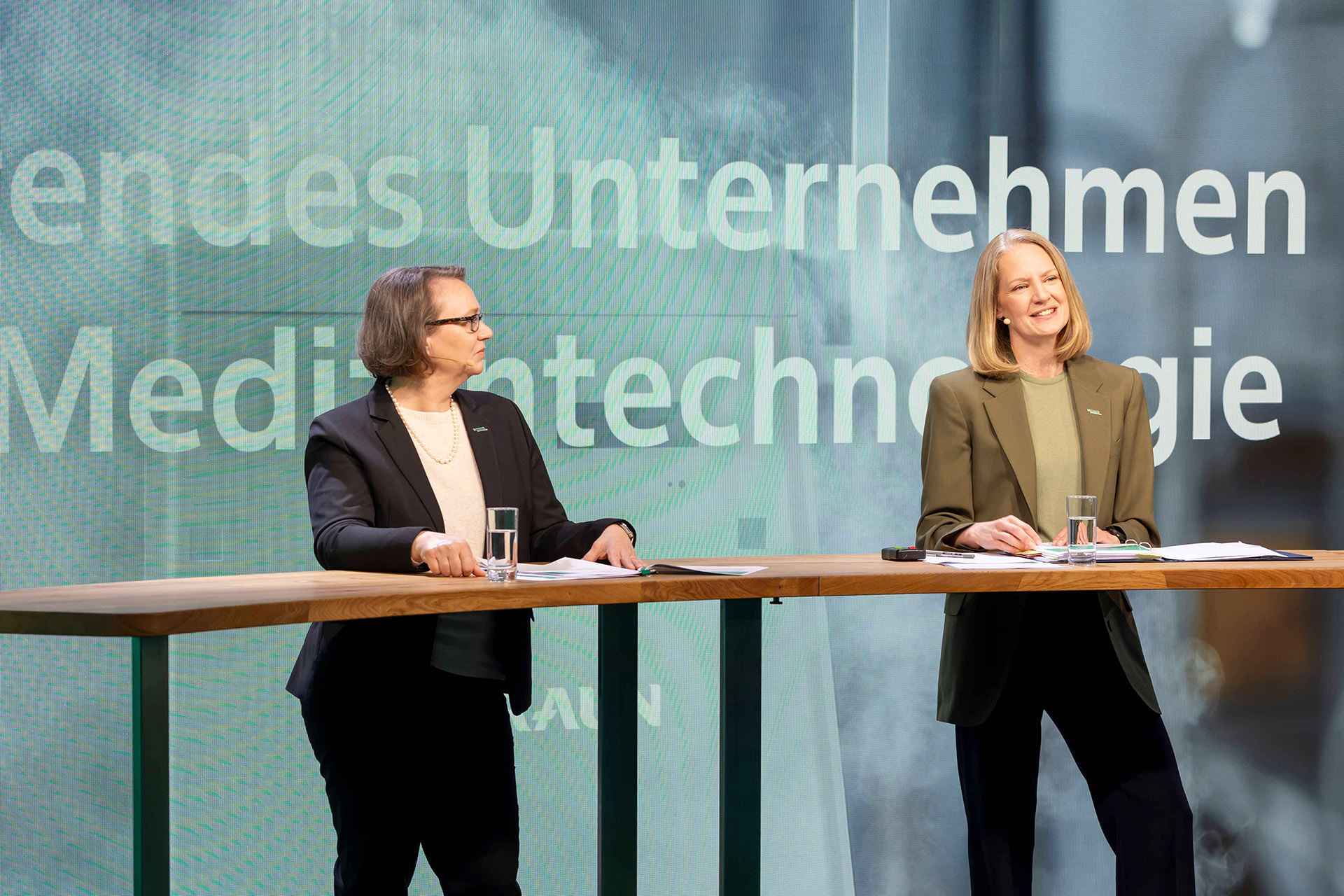 Anna Maria Braun presenting annual report conference titled empowered by technology